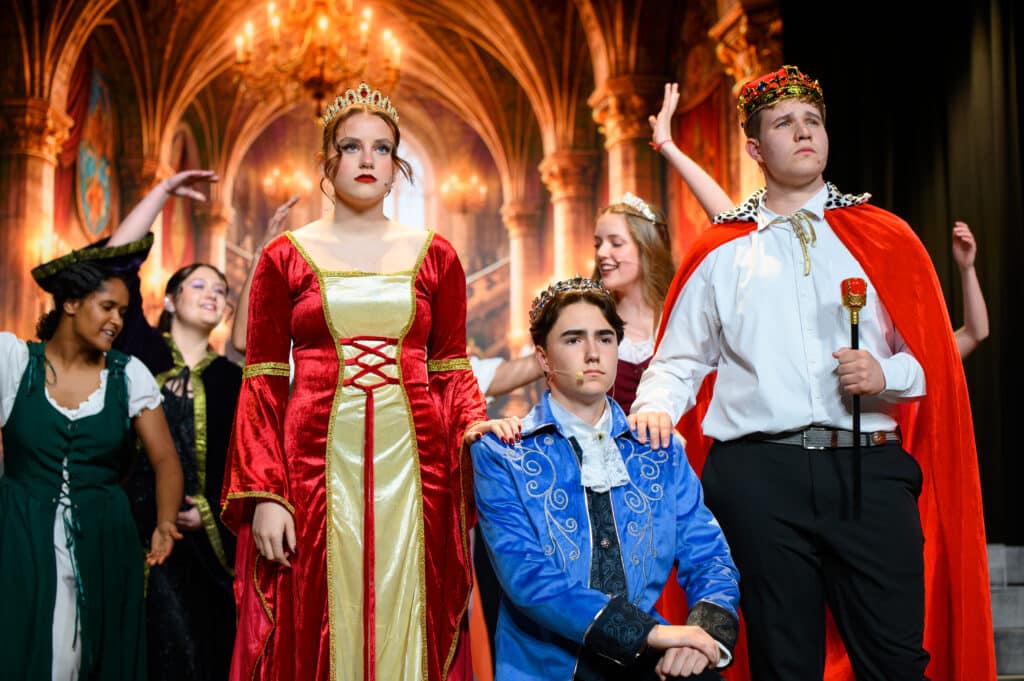 HCA students dressed in costume during theatre performance