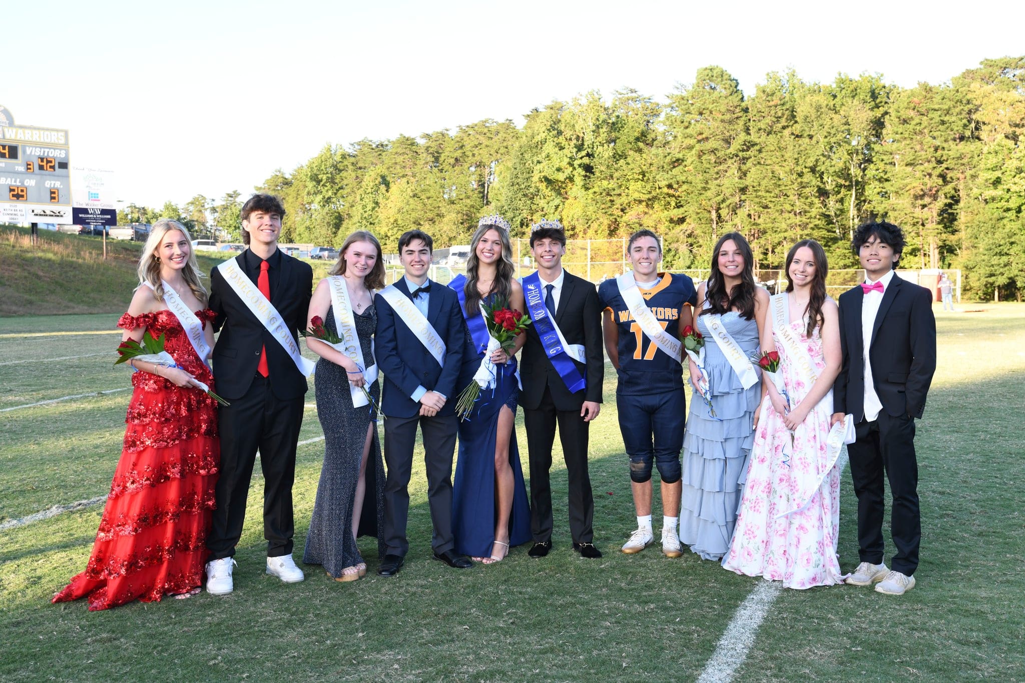 HCA Homecoming Court - girls in formal dresses and boys in suits